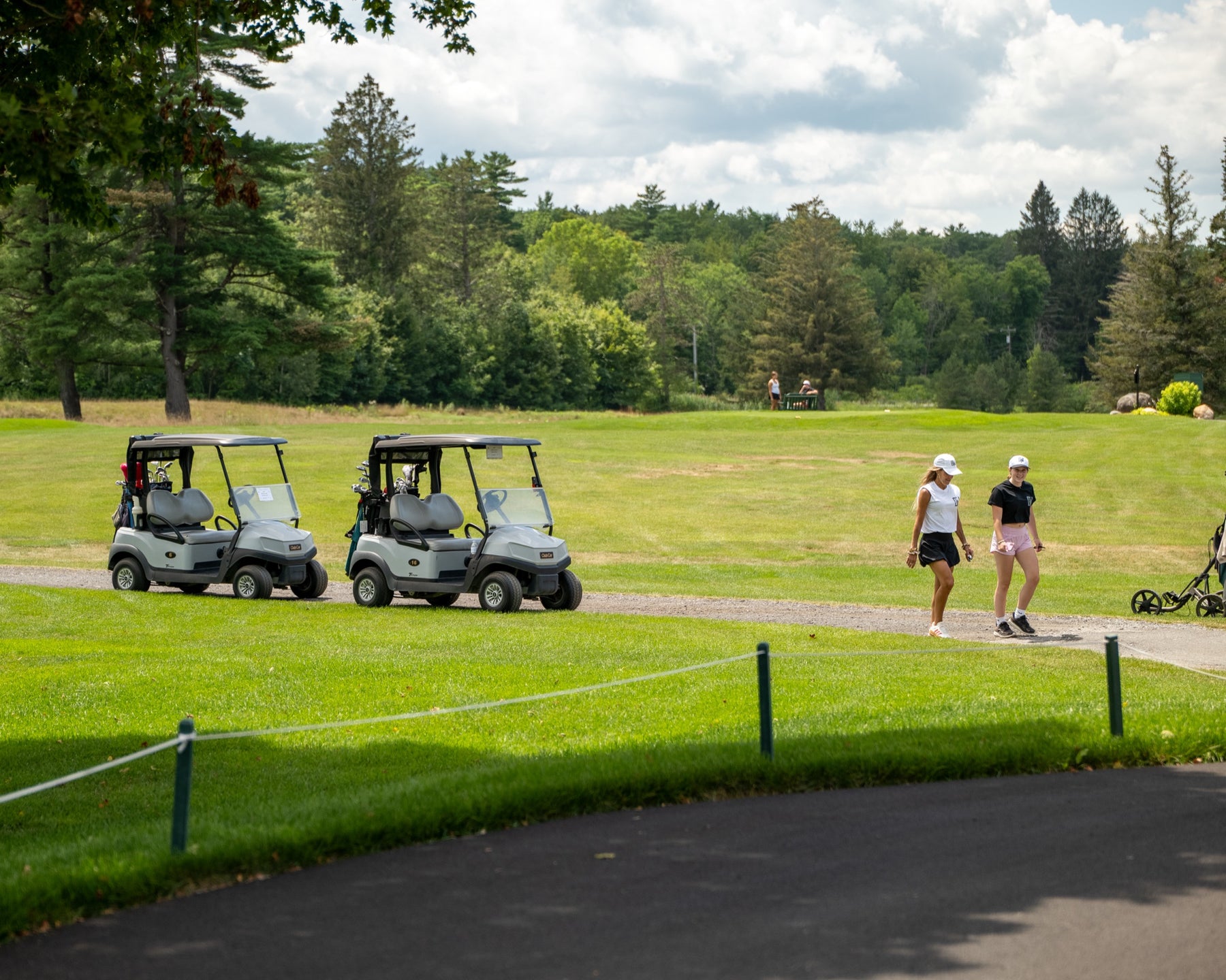 Golf carts and players on the course during the annual scholarship scramble